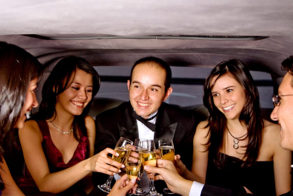 smiling friends toast champagne in a limousine 2026 03 26 01 24 44 utc
